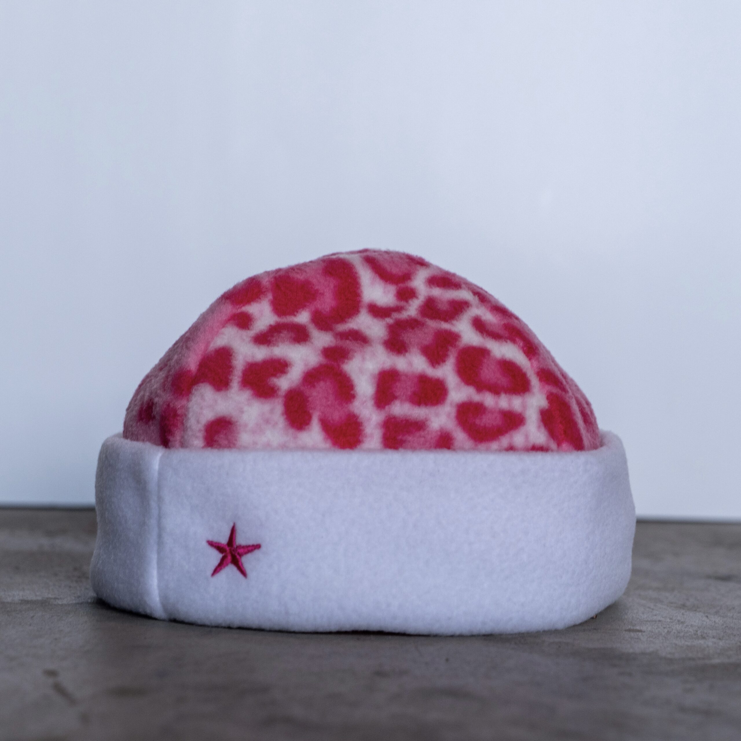 Pink Leopard Reversible Fleece Beanie (White)